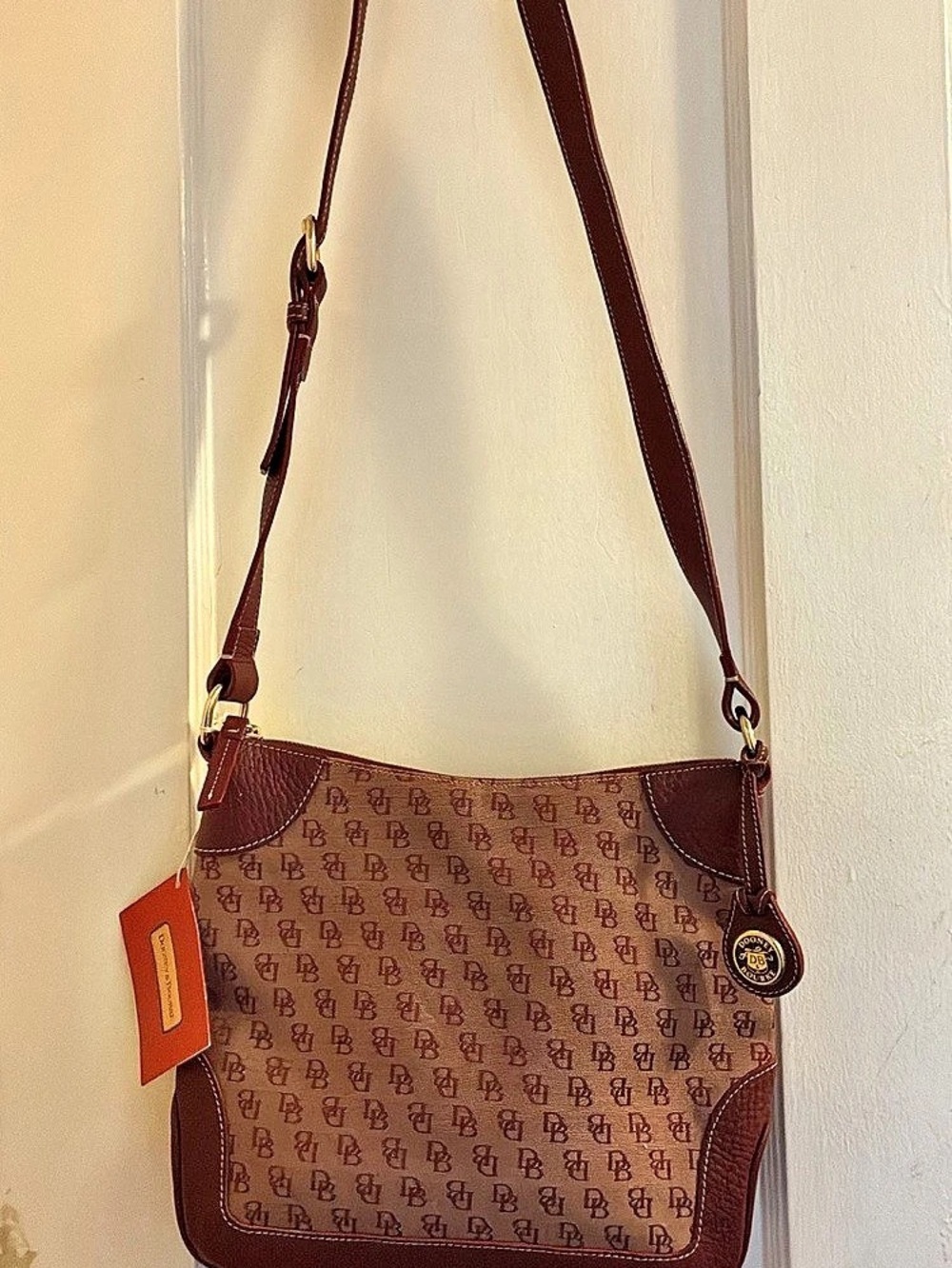 Dooney & Bourke Burgundy signature monogram canvas hobo bag